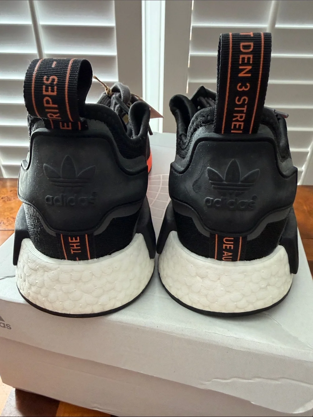 adidas Men’s Black Sneakers with Bright Orange Stripes
